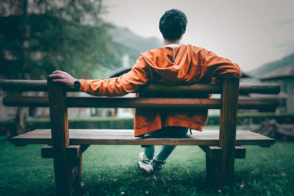 A man sitting in a park