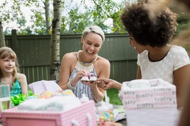 Two woman and a daughter at a baby shower