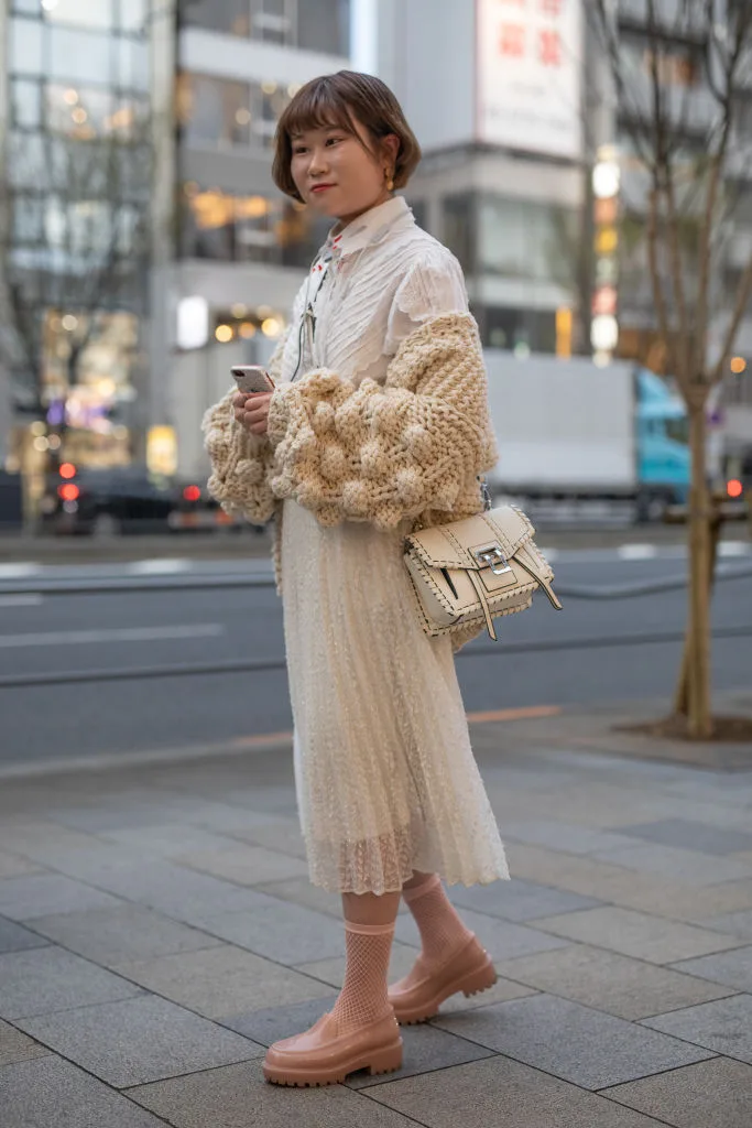 A guest at Amazon Fashion Week in TOKYO 2019 wearing knitted Mori Kei style