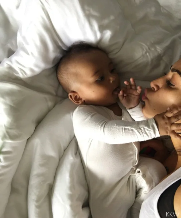 Kim cuddles up to her son Saint West
