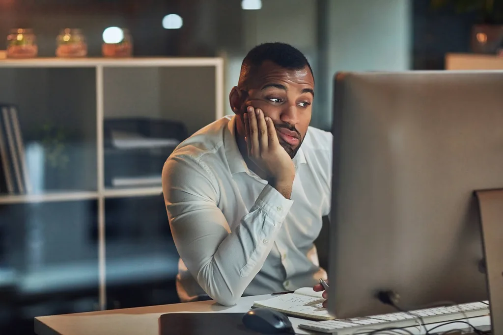 Man sitting on his computer