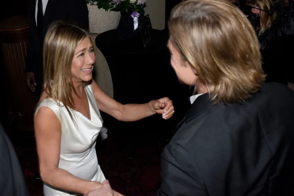 Jen and Brad backstage