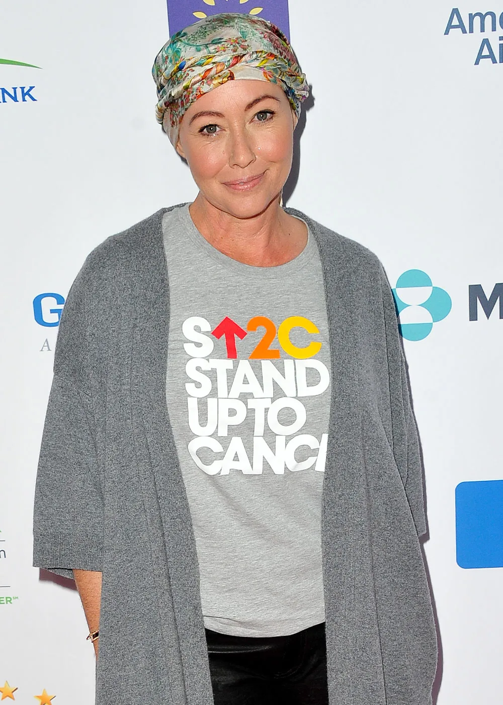 Shannon Doherty wearing hair bonnet after losing hair from breast cancer