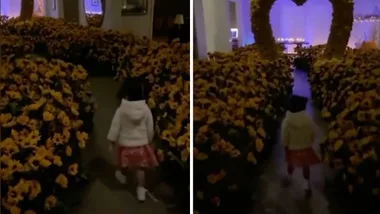 Kylie walks through house full of Sunflowers with Stormi on V-Day