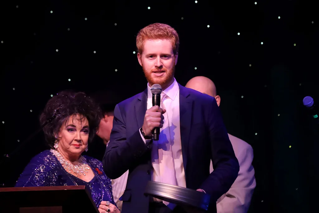 Elizabeth Taylor impersonator Louise Gallagher Smith (L) and Prince Harry, Duke of Sussex, impersonator Rhys Whittock (R).