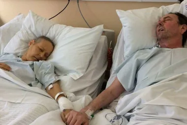 Children of terminally ill couple share heartbreaking last photo of their mum and dad