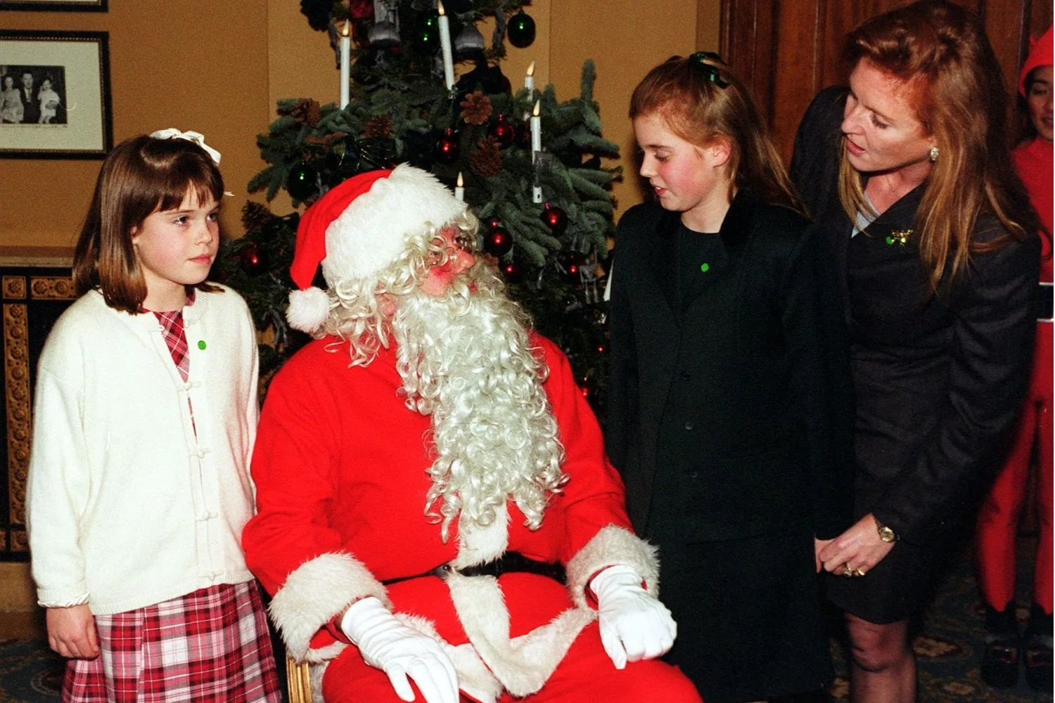 eugenie, beatrice and their mum sarah with santa