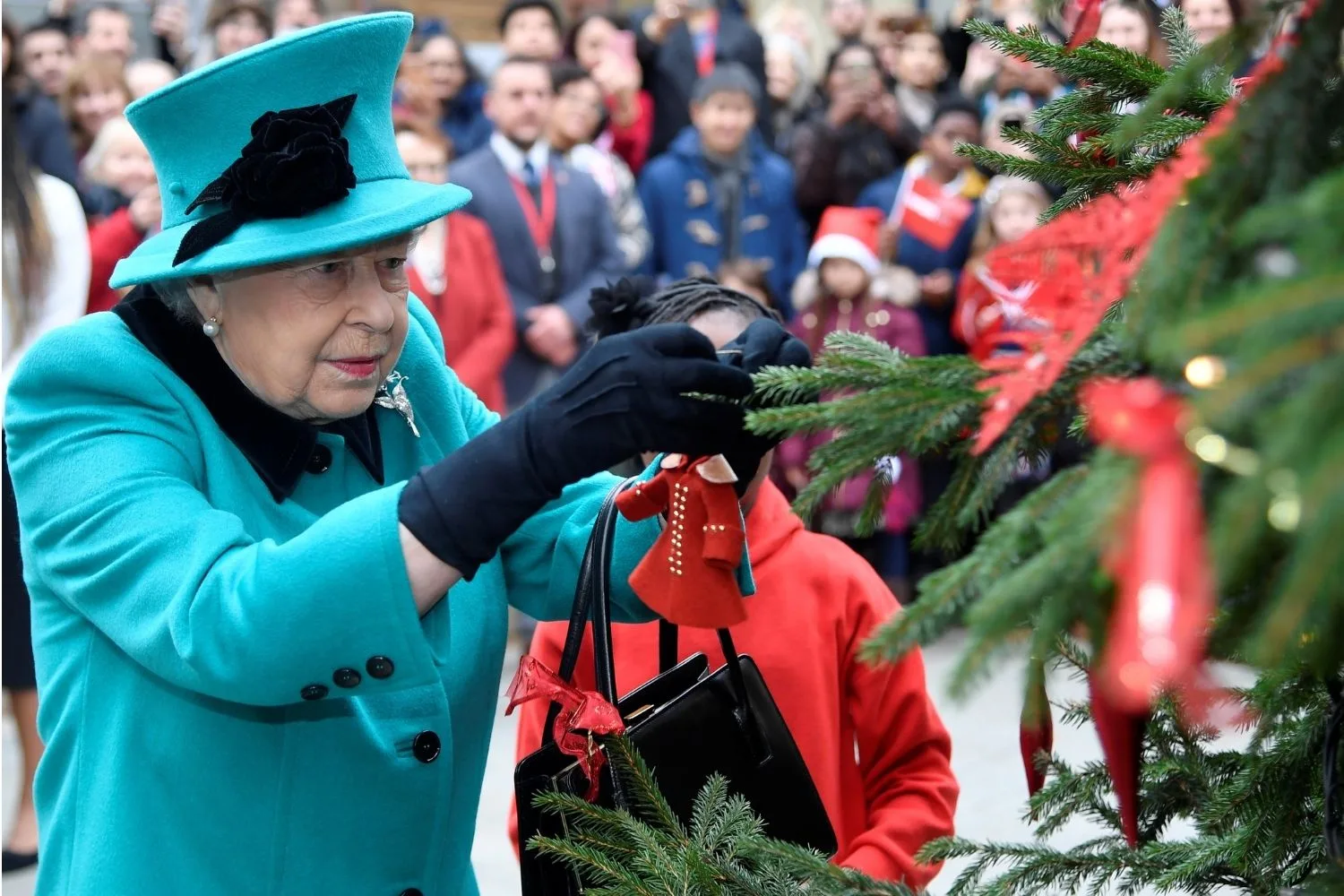 queen decorating tree