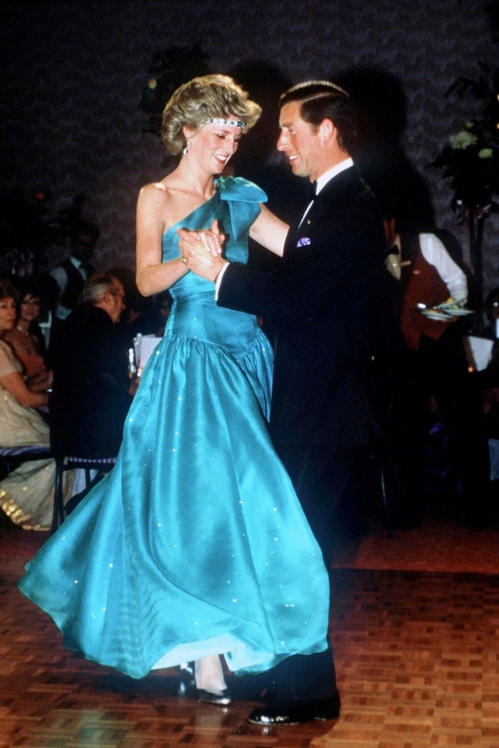 princess Diana dancing in blue dress with prince charles