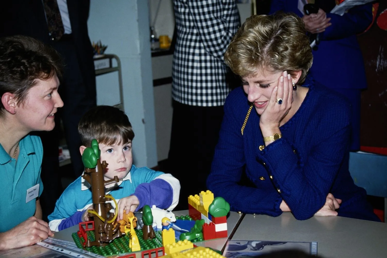 princess diana playing with kids and lego