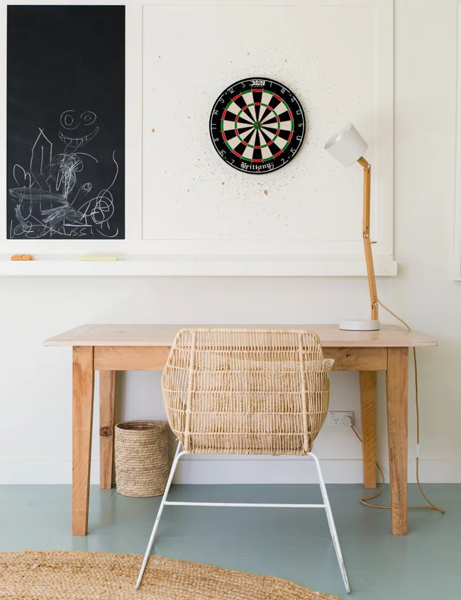 Beach house office space, black board, dart board