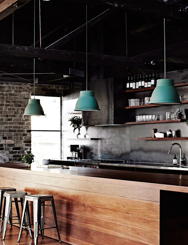 Set modern kitchen furniture in an atmosphere of industrial space
