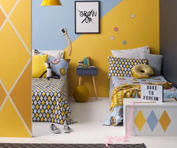 Give a shared kids’ room some individual style