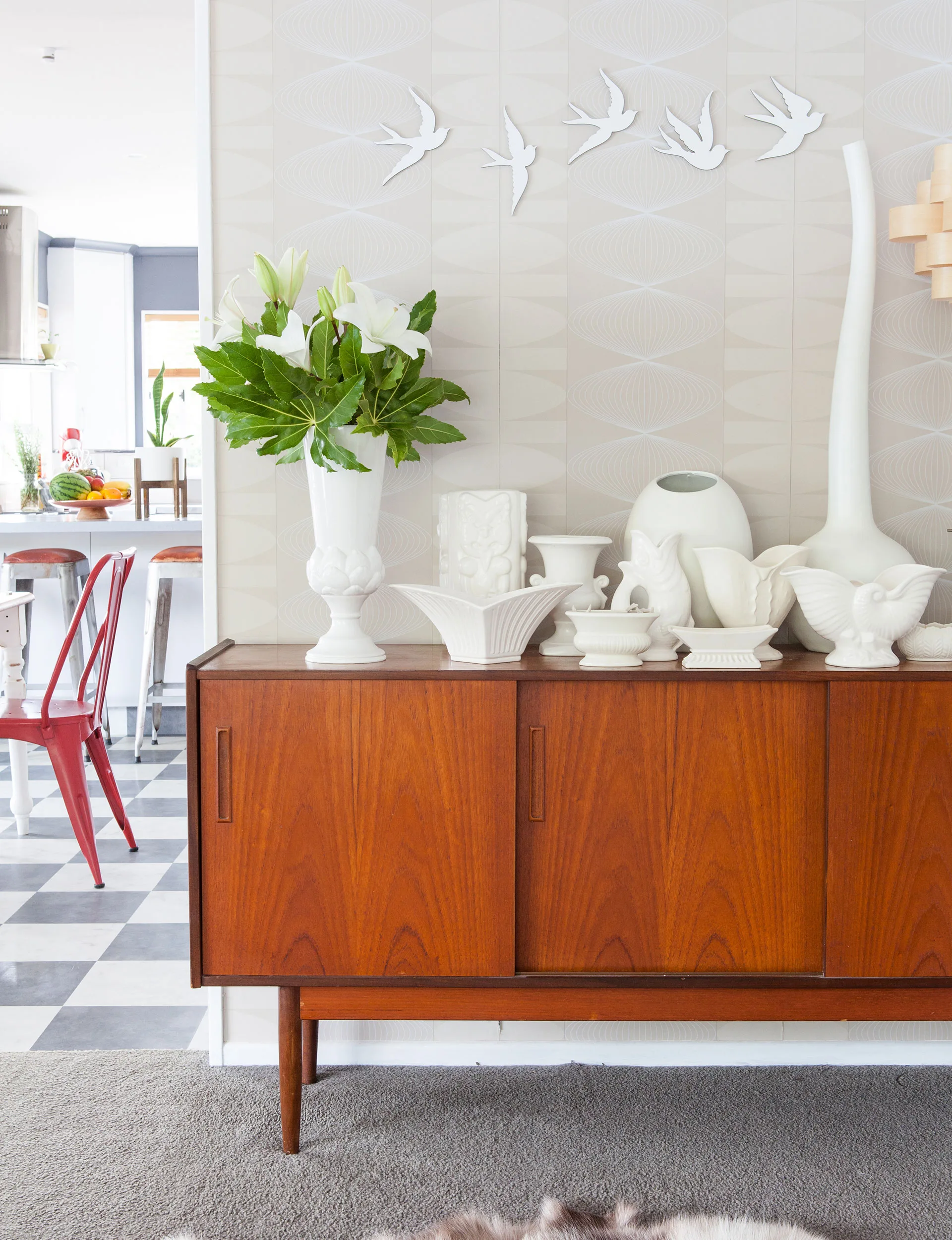 The sideboard in the lounge carries a collection of Crown Lynn.