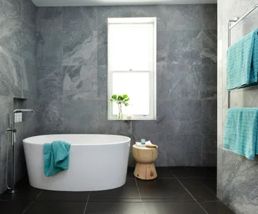 A functional, restful bathroom in grey