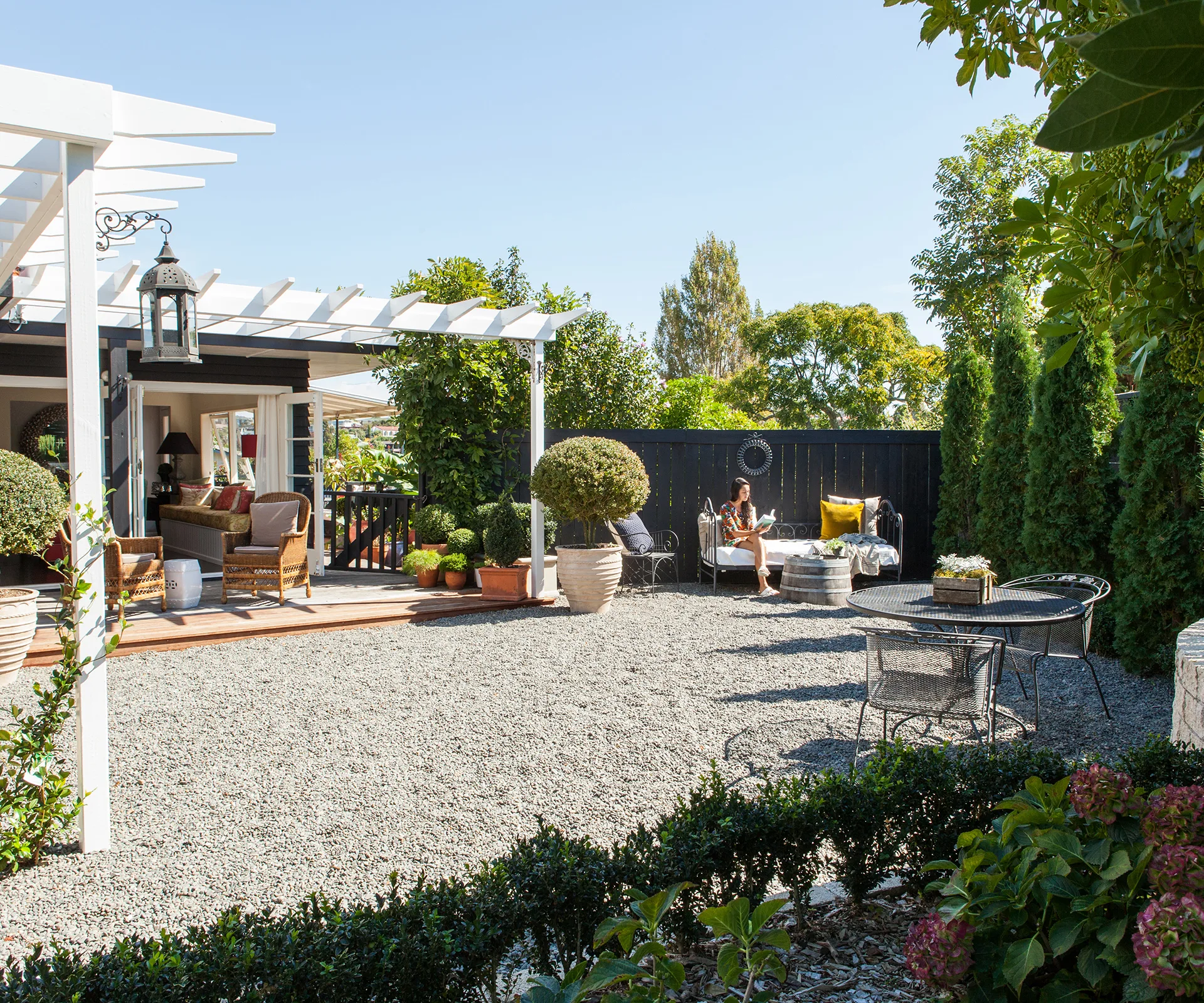Landscaper Penelope Clark came up with a plan for the garden to include pretty seating areas and lush planting. 