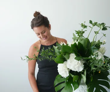 How to arrange flowers in a tall vase