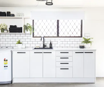This laundry went from dark and dusty to industrial chic