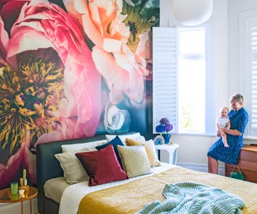 Oversized florals make a dramatic statement in this stylist’s bedroom