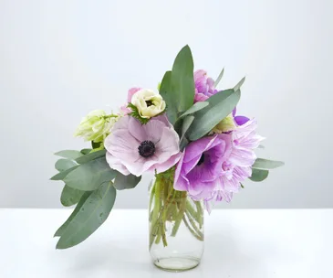 Floral arrangement in a jam jar