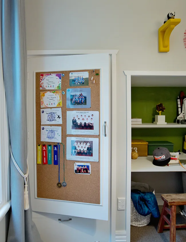 A cork board makes for a great spot to display mementos.