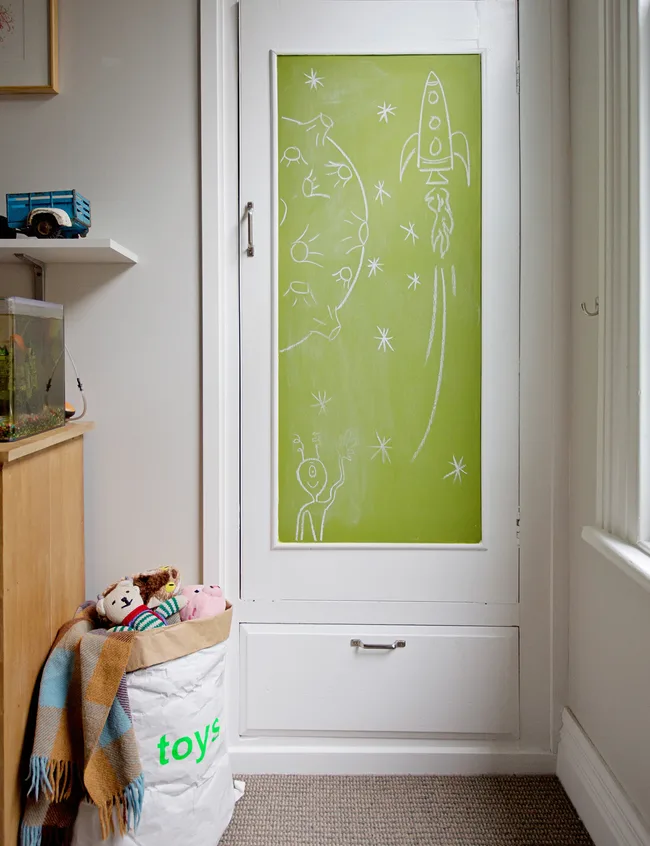 In Oscar&rsquo;s room Shelley has introduced a splash of colour by painting the wardrobe door.