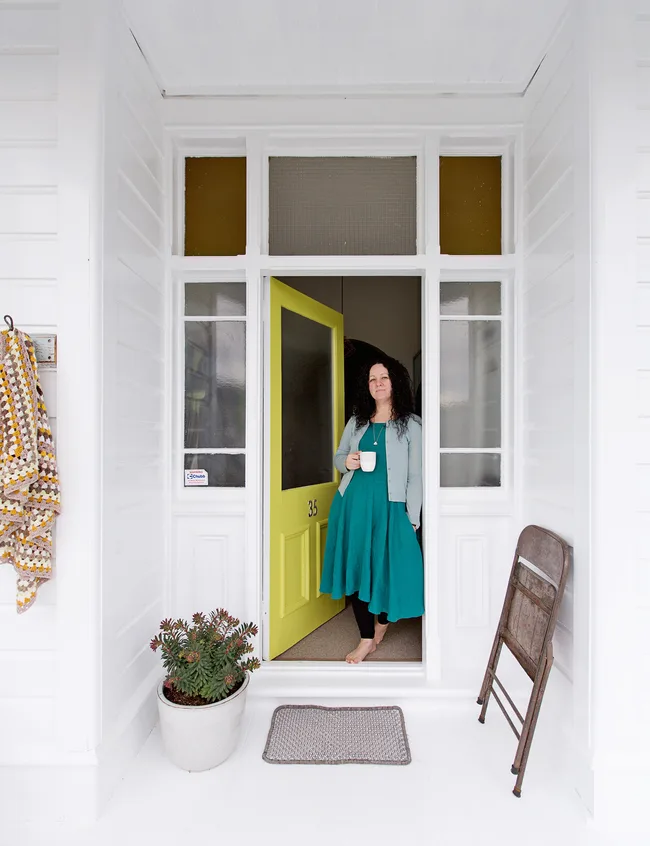 Beautiful stained glass-windows frame the entryway.