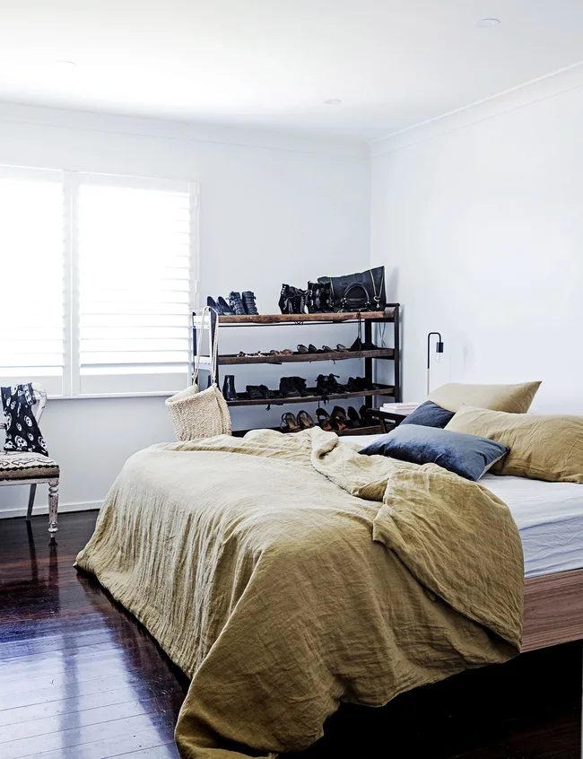 A custom made bed completes the bedroom.