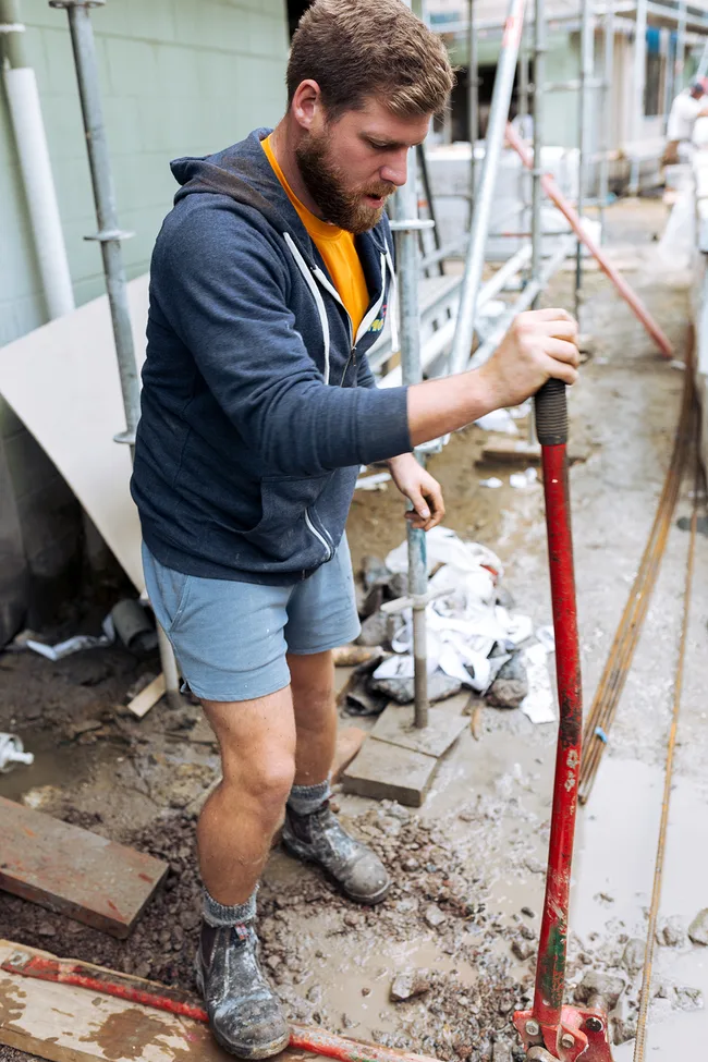 Emmett getting stuck into the dirty work on The Block NZ.