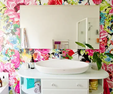 A budget-friendly bathroom revamp with a floral and flirty theme