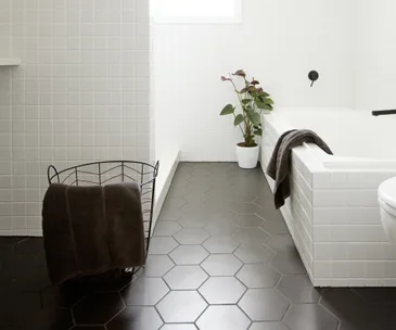 An original 1960s bathroom gets a black and white makeover