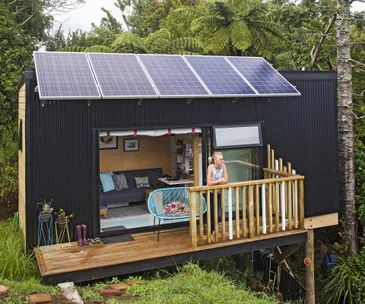 A house the size of a shipping container has everything its owners need