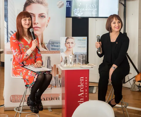 Naomi speaking with Elizabeth Arden's Liden Erasmus.