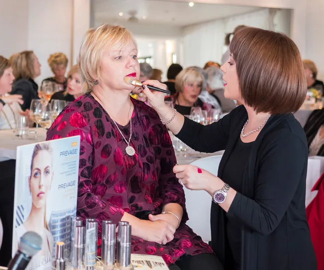Elizabeth Arden's Liden Erasmus doing a guest's make-up during her talk.
