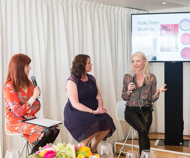 Simply You editor Naomi Larkin speaking with Resene's Sarah Gregory and Carpet Court's Jane Carolan.