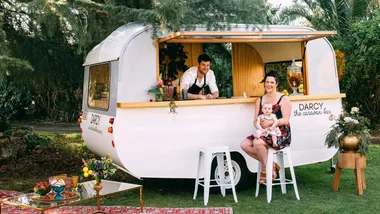 This young family lovingly restored this dilapidated caravan to become an outdoor bar