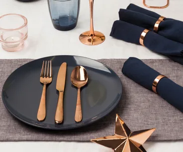 Nail your Christmas table setting with copper and navy