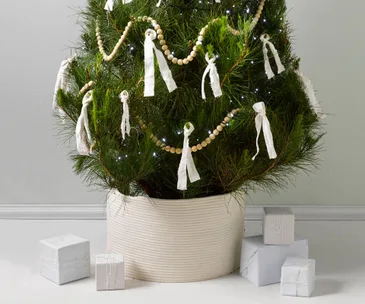 4 hacks for hiding that unsightly Christmas tree base