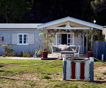Classic Kiwi bach do-up helps to reveal a hidden coastal gem