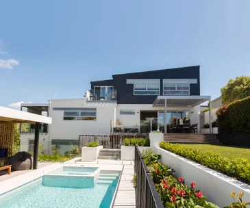 An Auckland couple create a resort style garden in the city