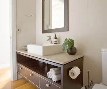 The mood of this bathroom was lifted thanks to a few final touches