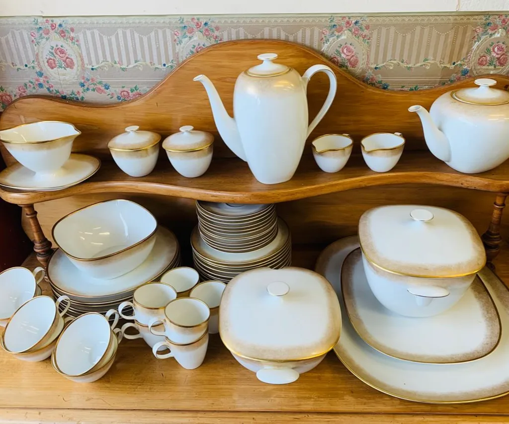 A collection of ceramic second-hand homewares including jugs, serve ware, mugs, plates and saucers, on display at Antique Alley in Auckland.