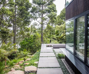 An Asian inspired design transforms a steep site in the Waitakere Ranges