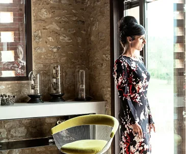 The interior of this rustic farmhouse is transformed with rich design