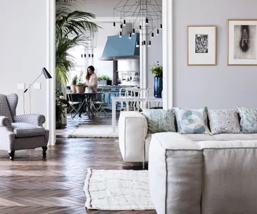 A grand character apartment is sensitively updated with Italian flair