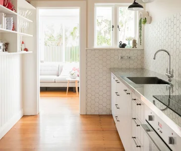 A 1920s bungalow kitchen has balanced modern living with heritage style