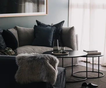 How to embrace moody colours and comforting layers in your home
