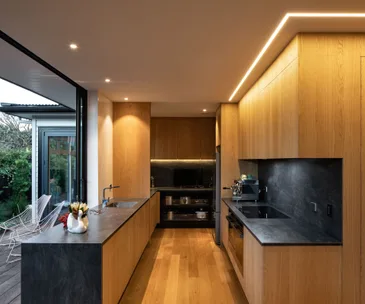 This streamlined modern kitchen is an entertainer’s dream
