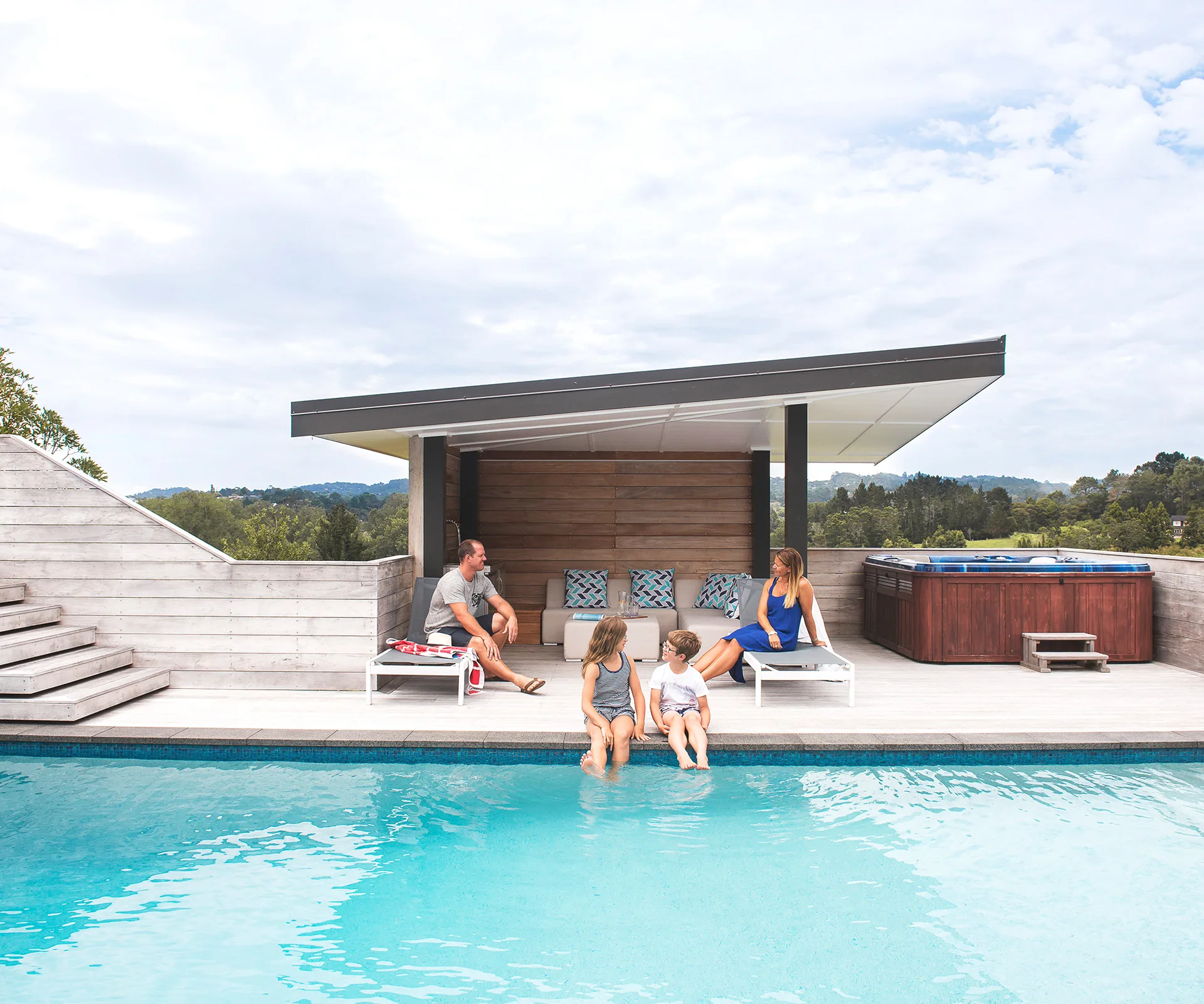 This tropical inspired pool has the ultimate diving platform