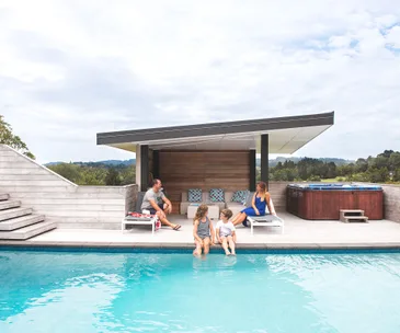 This tropical inspired pool has the ultimate diving platform